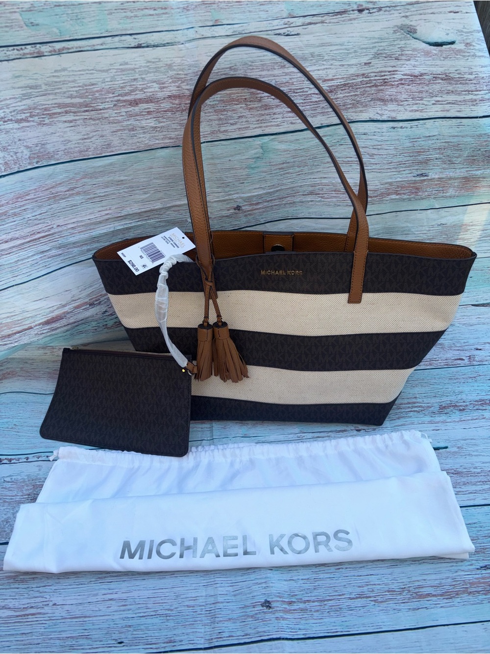 NWT Michael Kors Striped Canvas Large East West Tote with pouch and a dust bag
